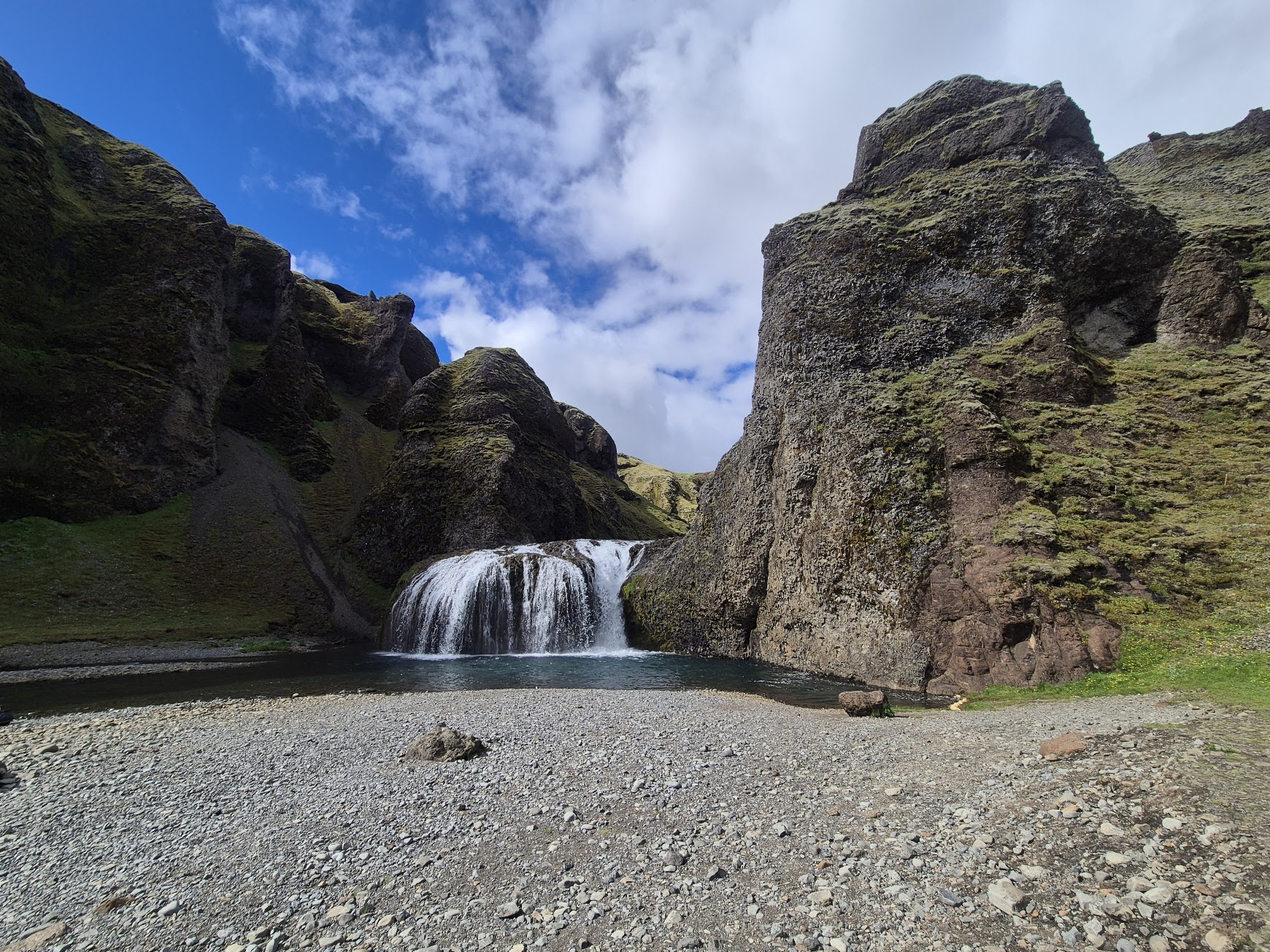 Stjórnarfoss waterfall in a small mossy canyon near Kirkjubæjarklaustur